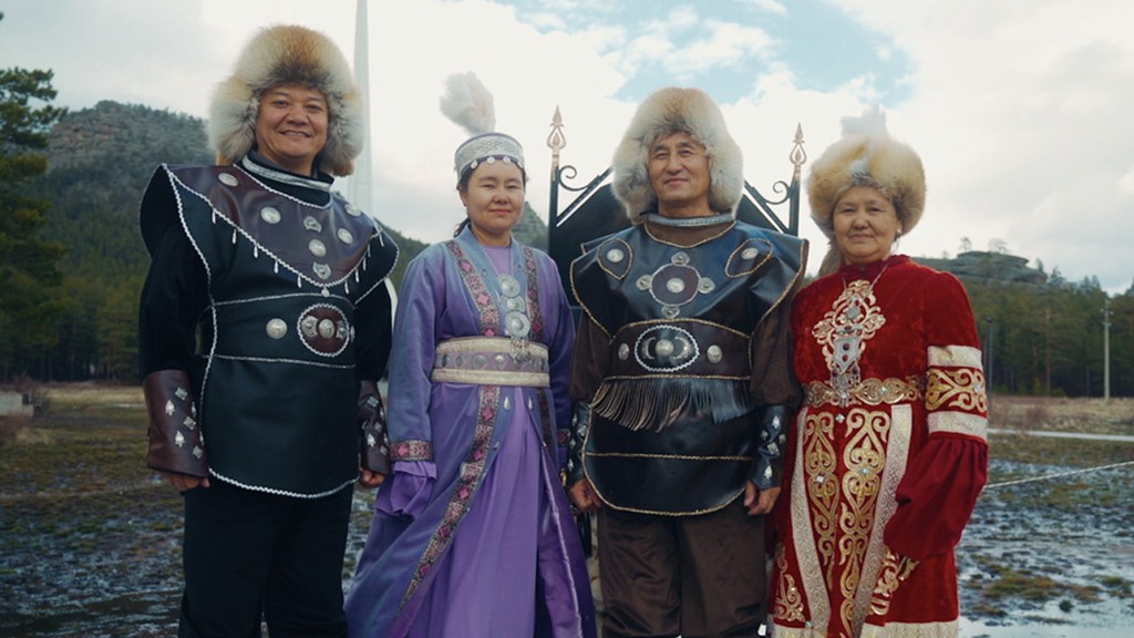 Kazakh hosts in traditional dress, filmed for Travel by Dart